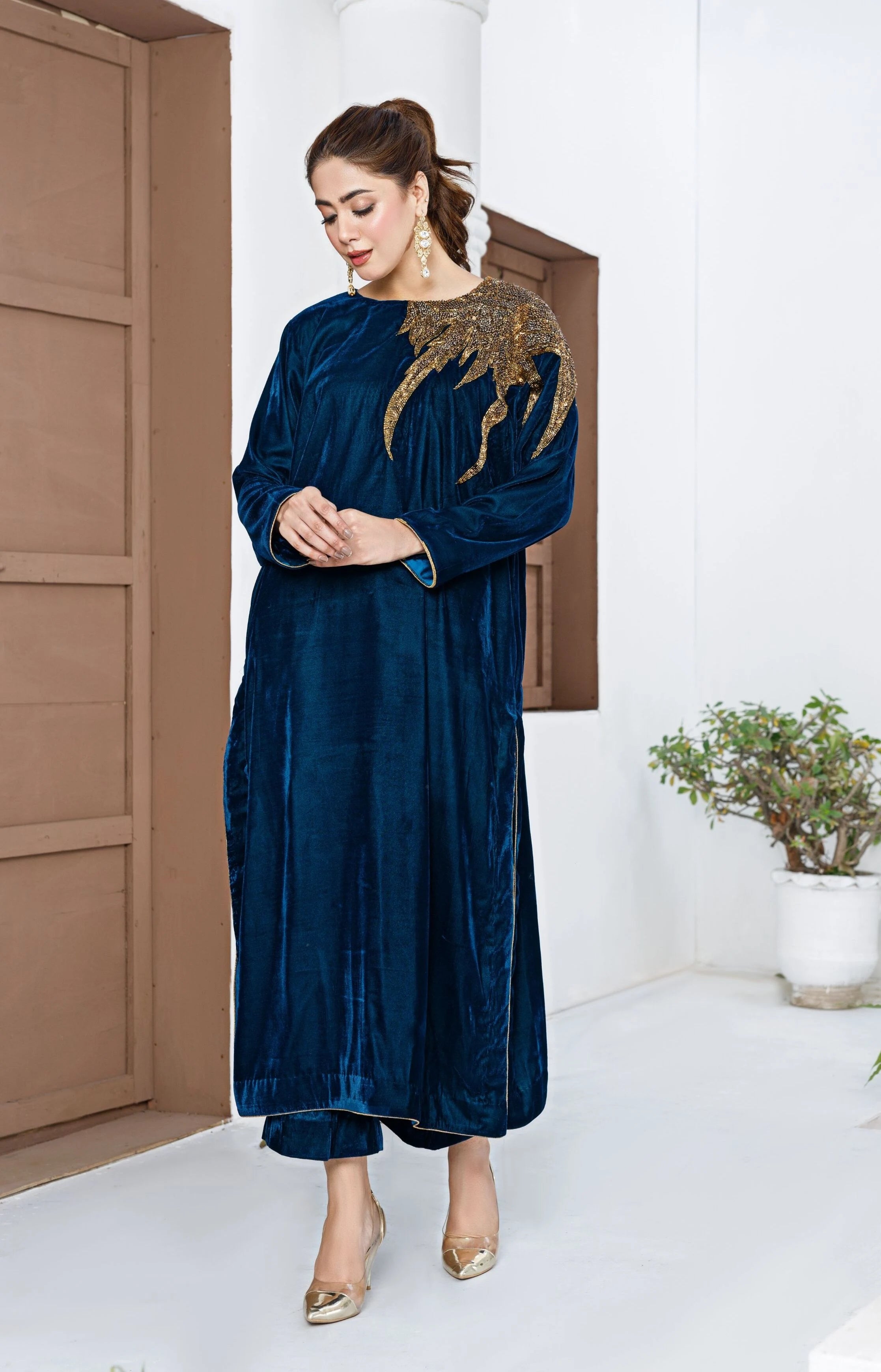 Party wear designer black velvet pret suit with a trendy cut and premium velvet finish