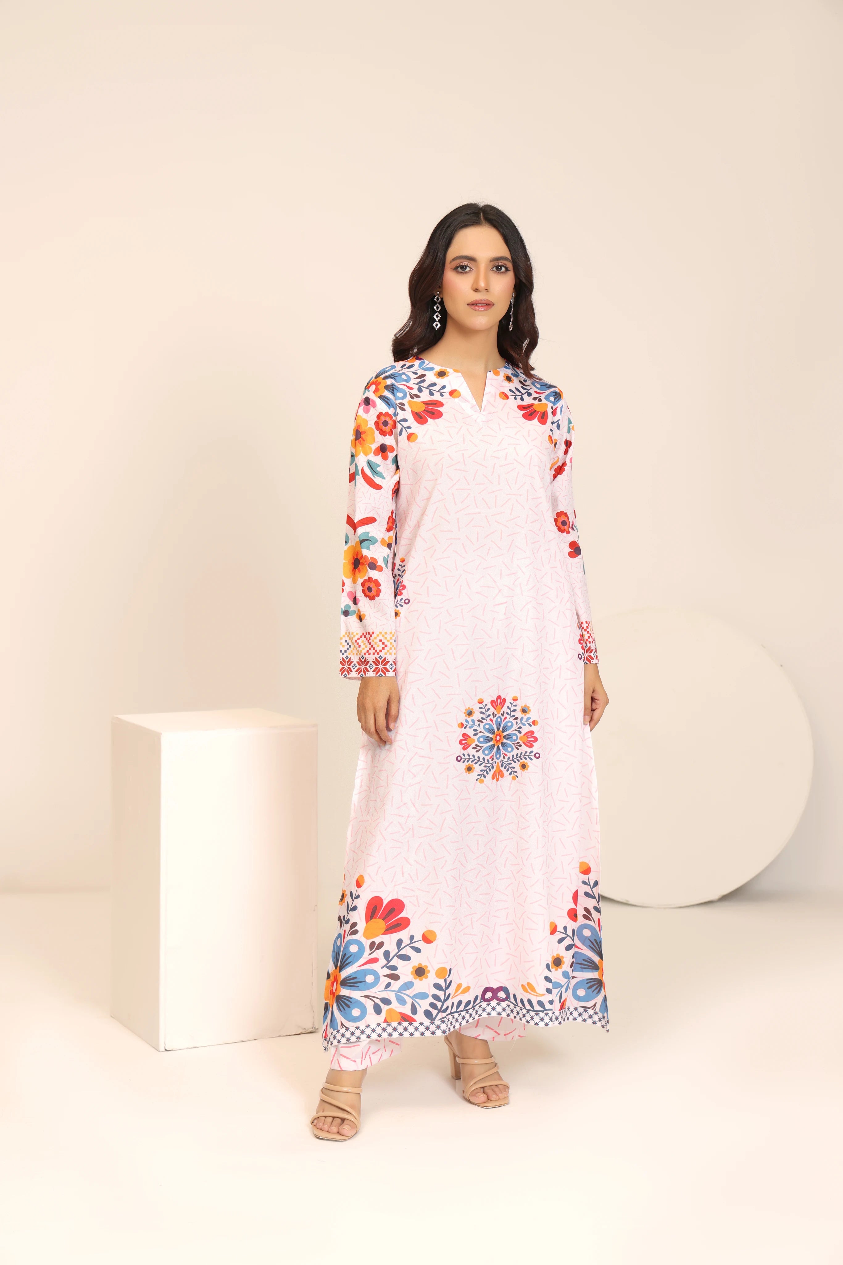 woman posing in white dress pakistani printed outfit buraqstore