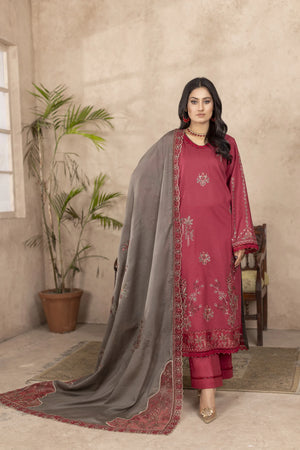 Girl wearing elegant maroon lawn dress design by buraqstore Pakistan