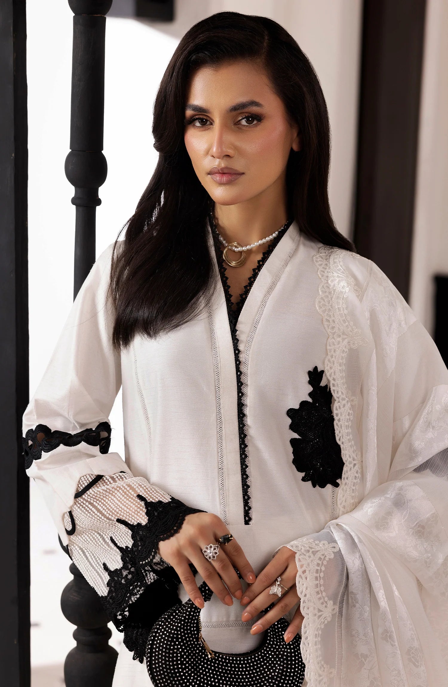 woman posing in white raw silk suit buraqstore elegant outfit