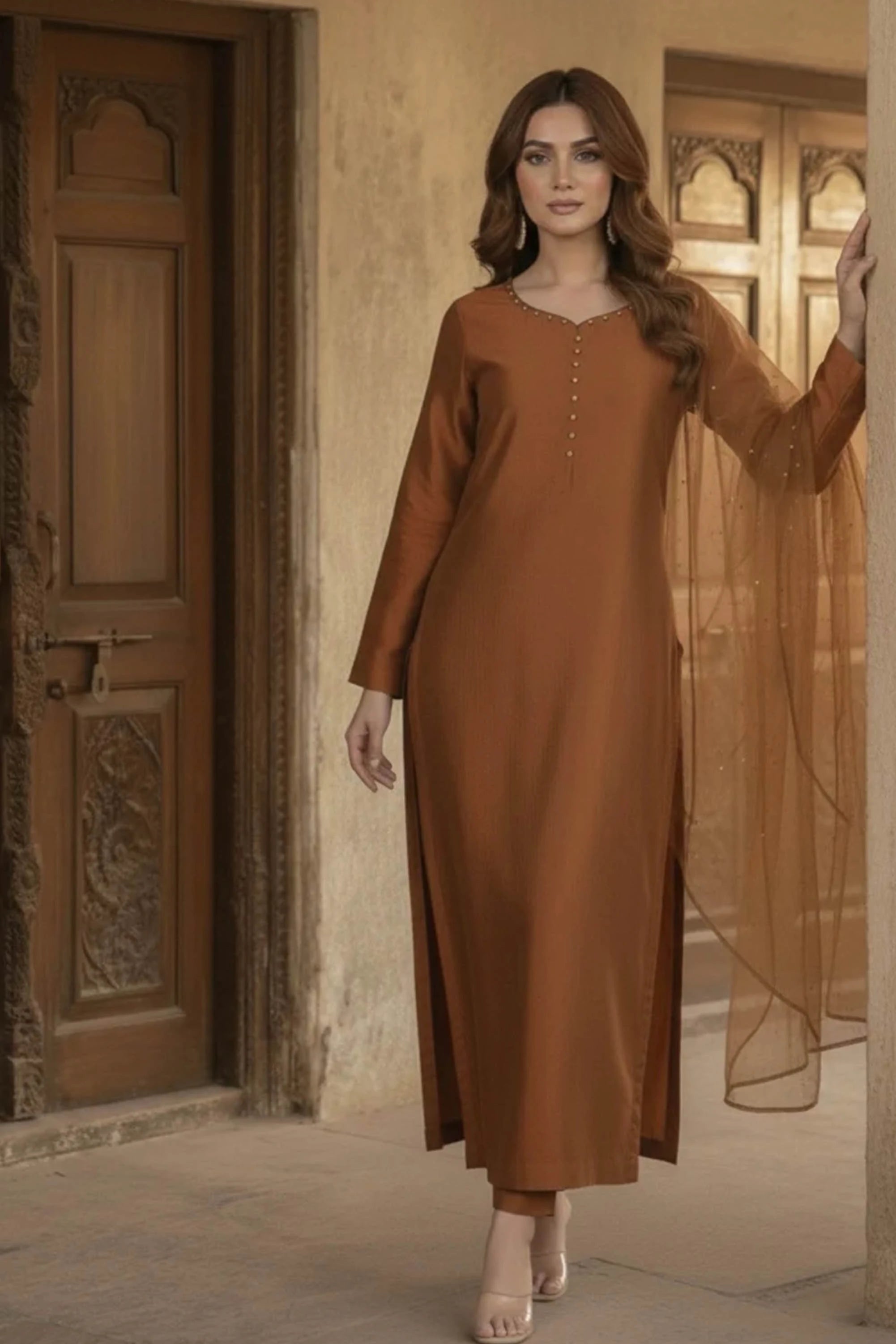 Girl wearing luxurious silk dress by Buraqstore with festive look