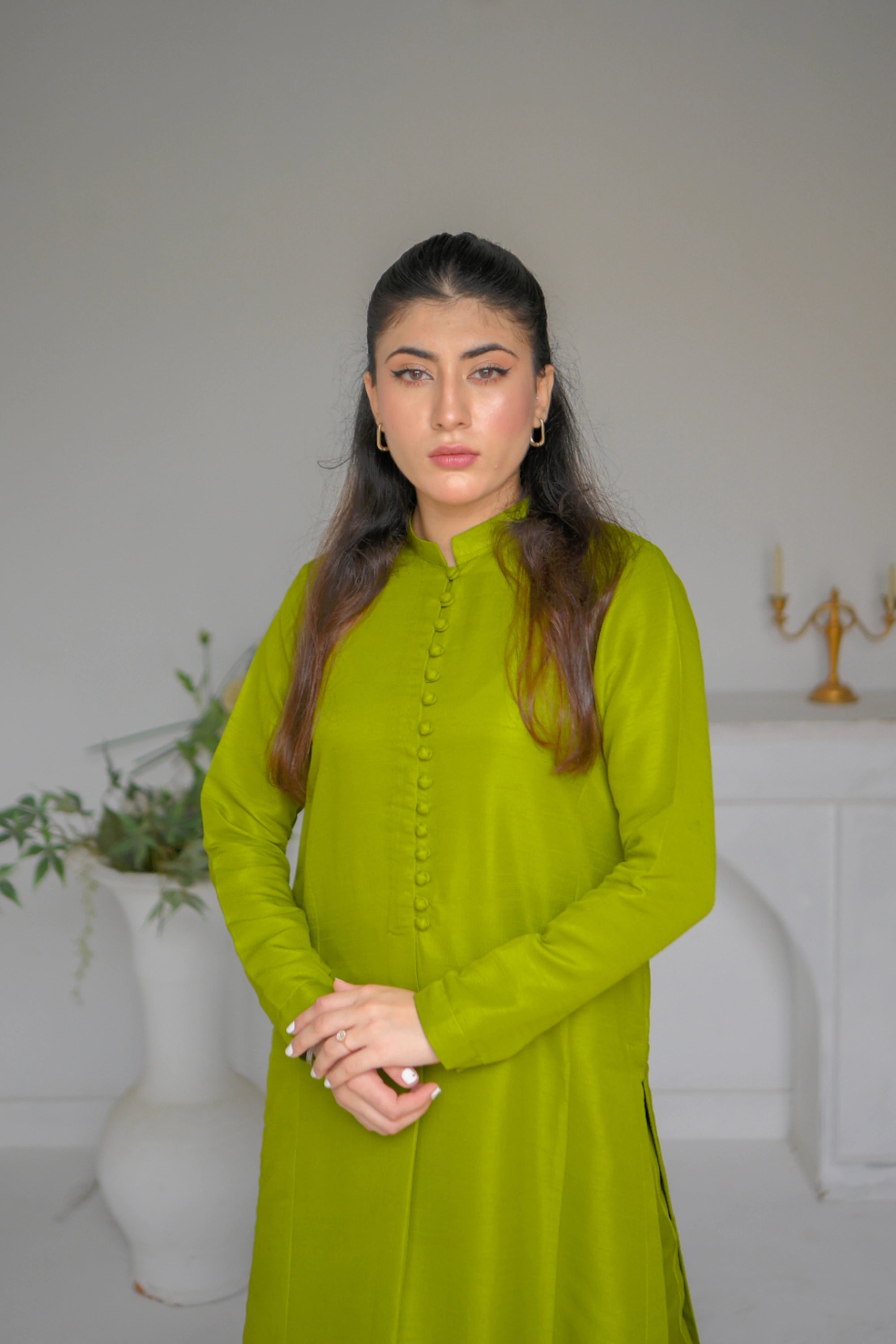model posing in olive green dress by buraqstore stylish wear