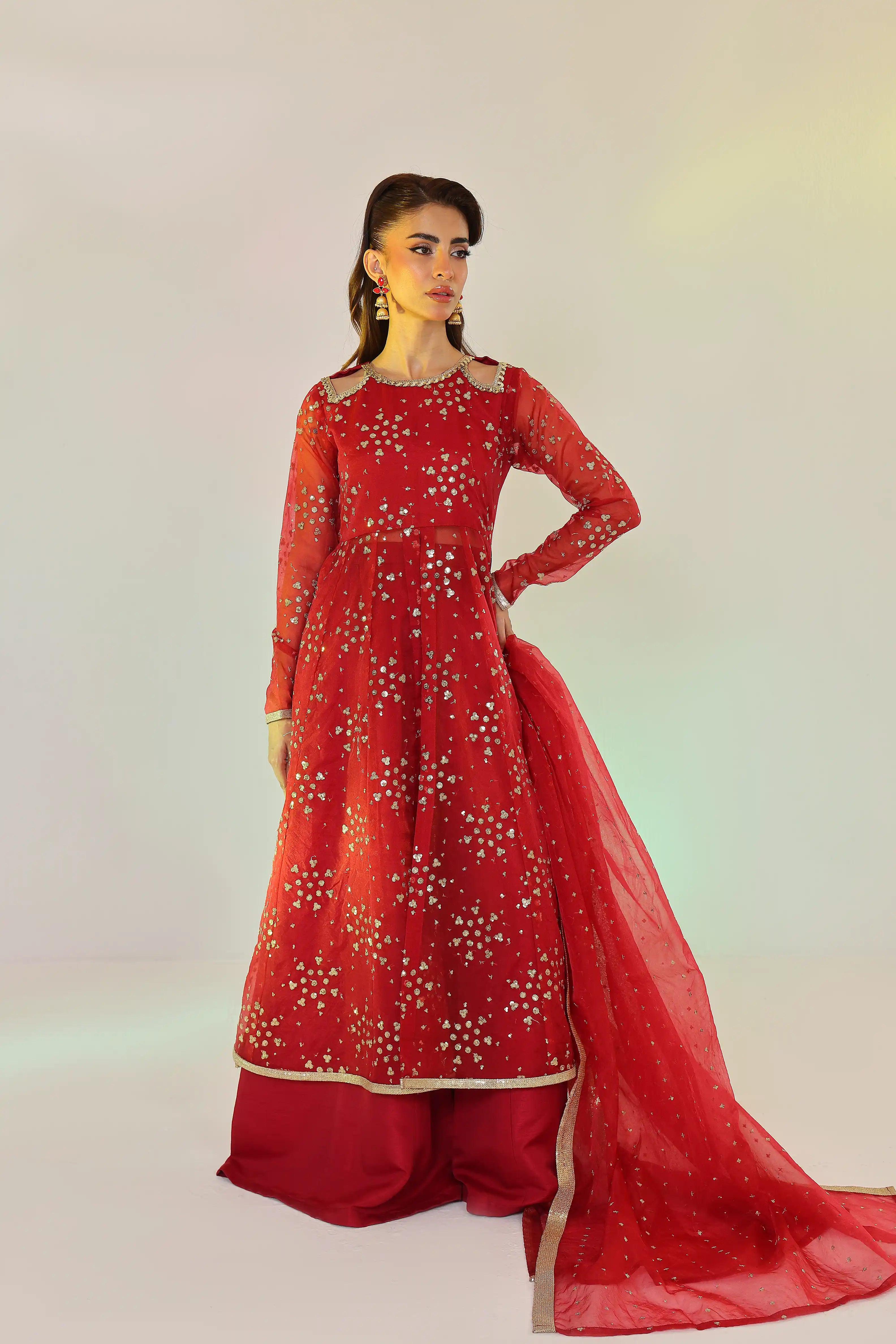 Buraqstore bride style shoot with girl in heavy red colour dress organza embroidery