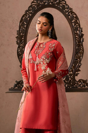 Woman posing in a stylish rose pink Lucia tissue silk 3 piece outfit from the Dastoor collection, featured at Buraq Store