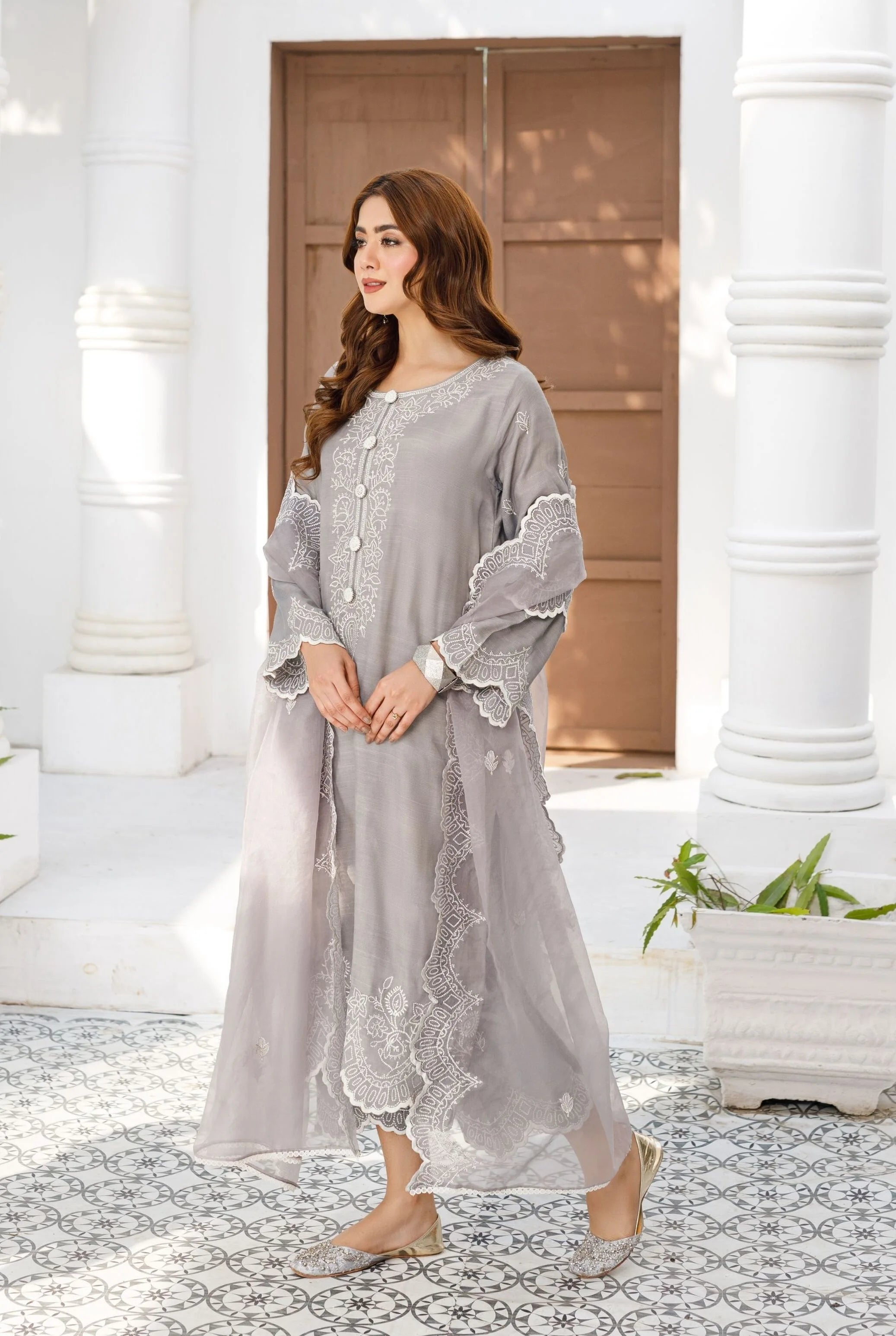 Girl wearing elegant silk dress by Buraqstore styled for evening wear