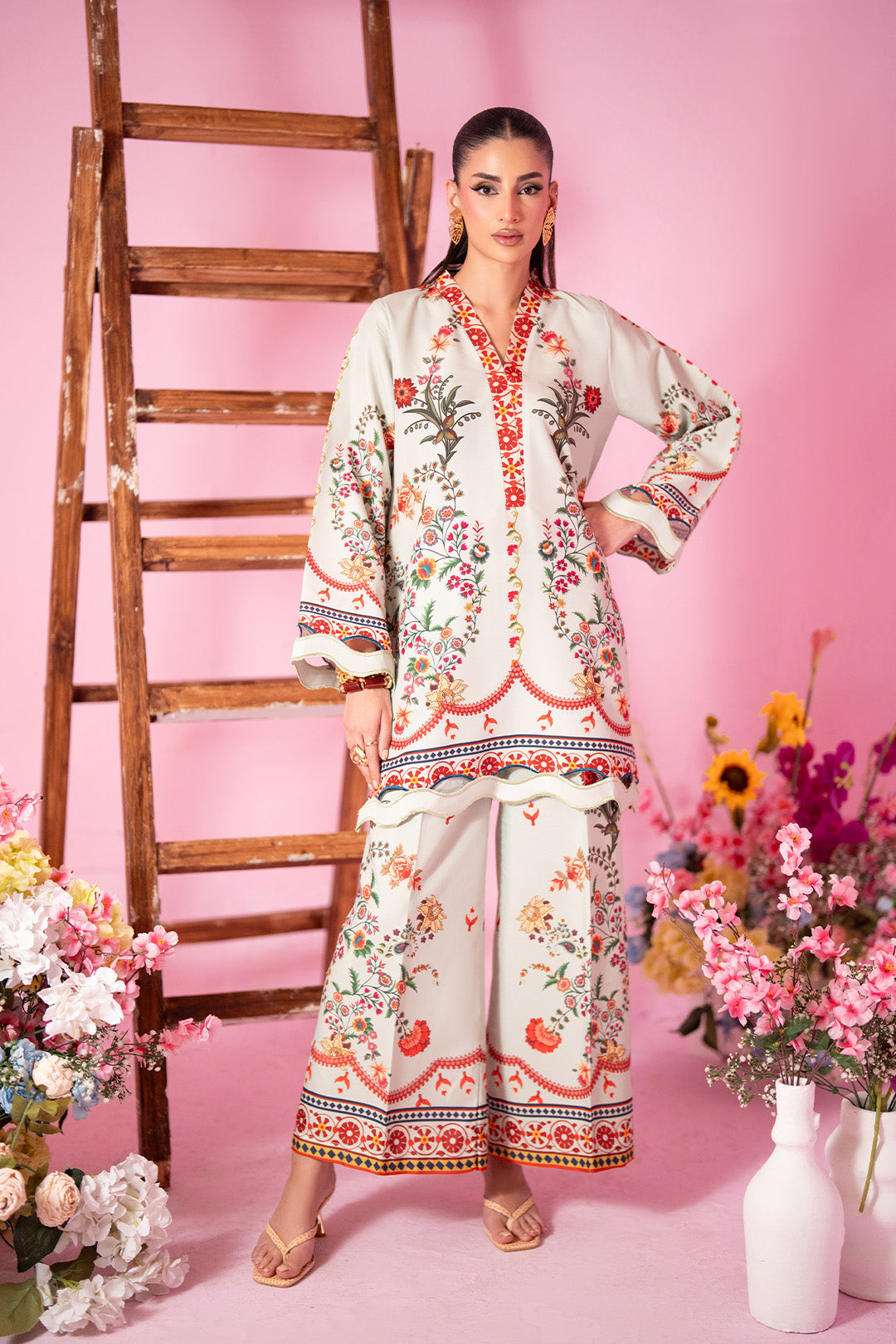 Woman posing in a soft mint green co-ord set from Sidra Fahad official, featured at Buraq Store