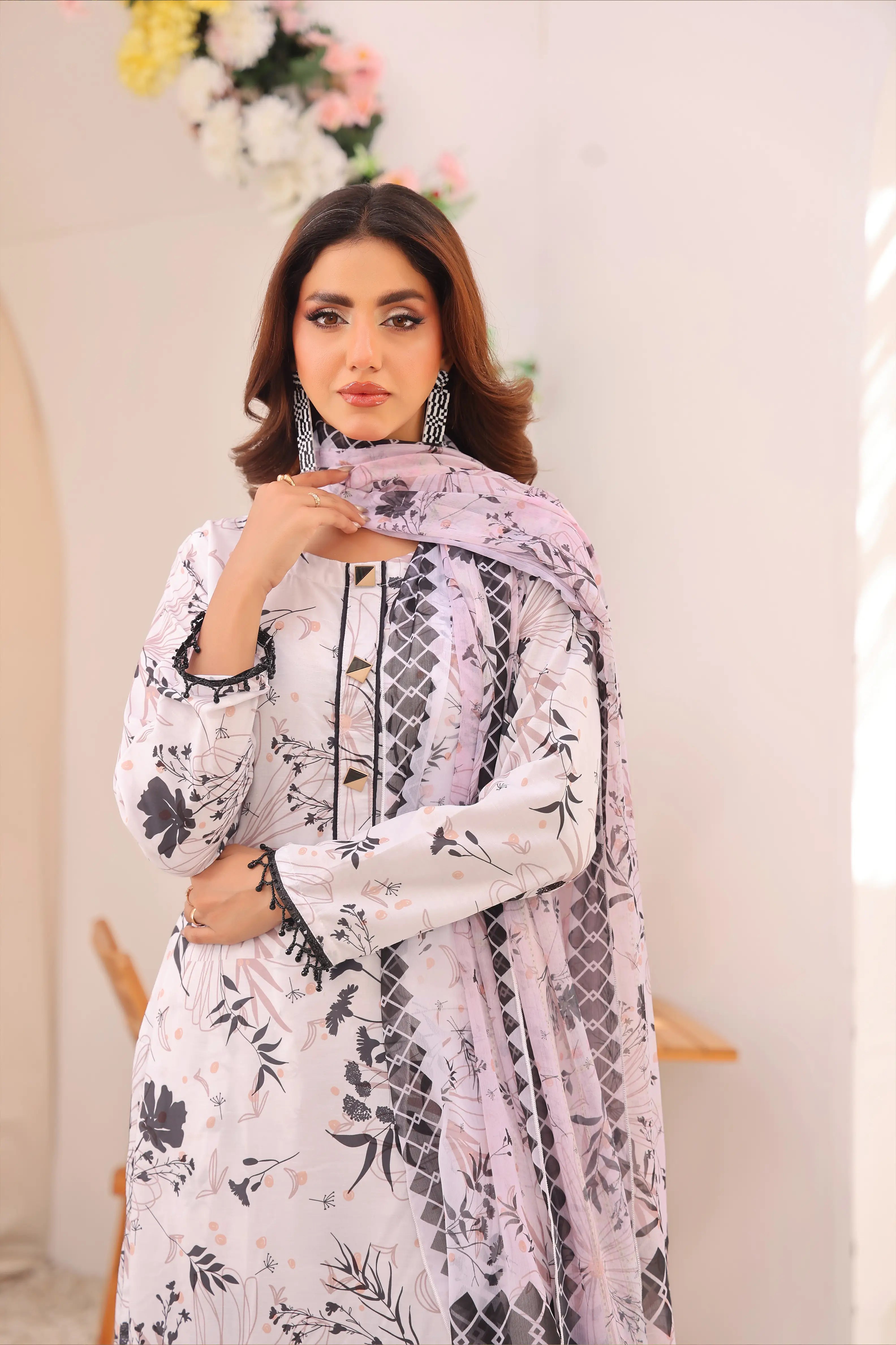 woman posing in white dress pakistani lawn outfit buraqstore