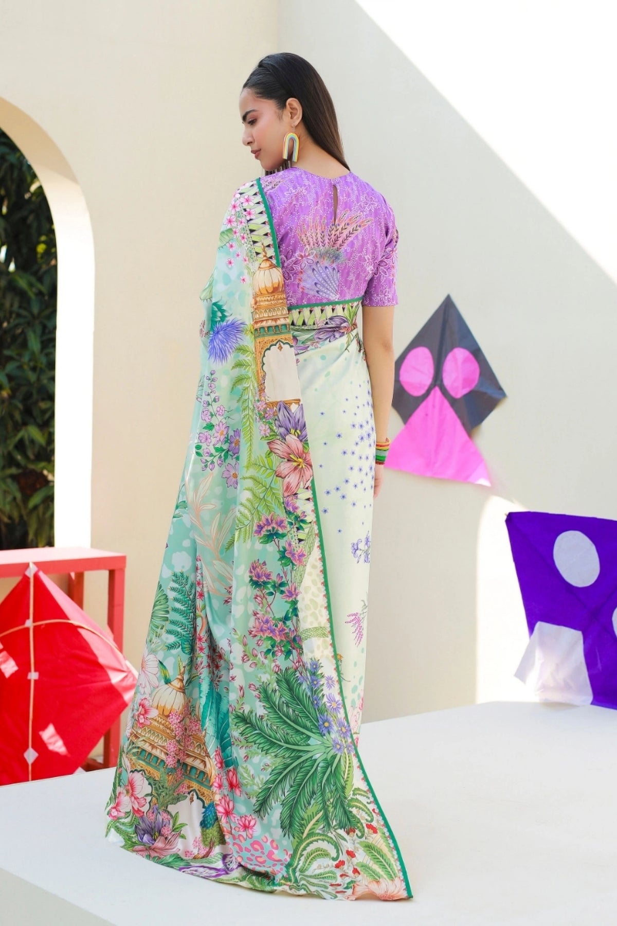 Woman wearing a stylish Poly Parsley saree and blouse from the Anayra Amal collection, featured at Buraq Store
