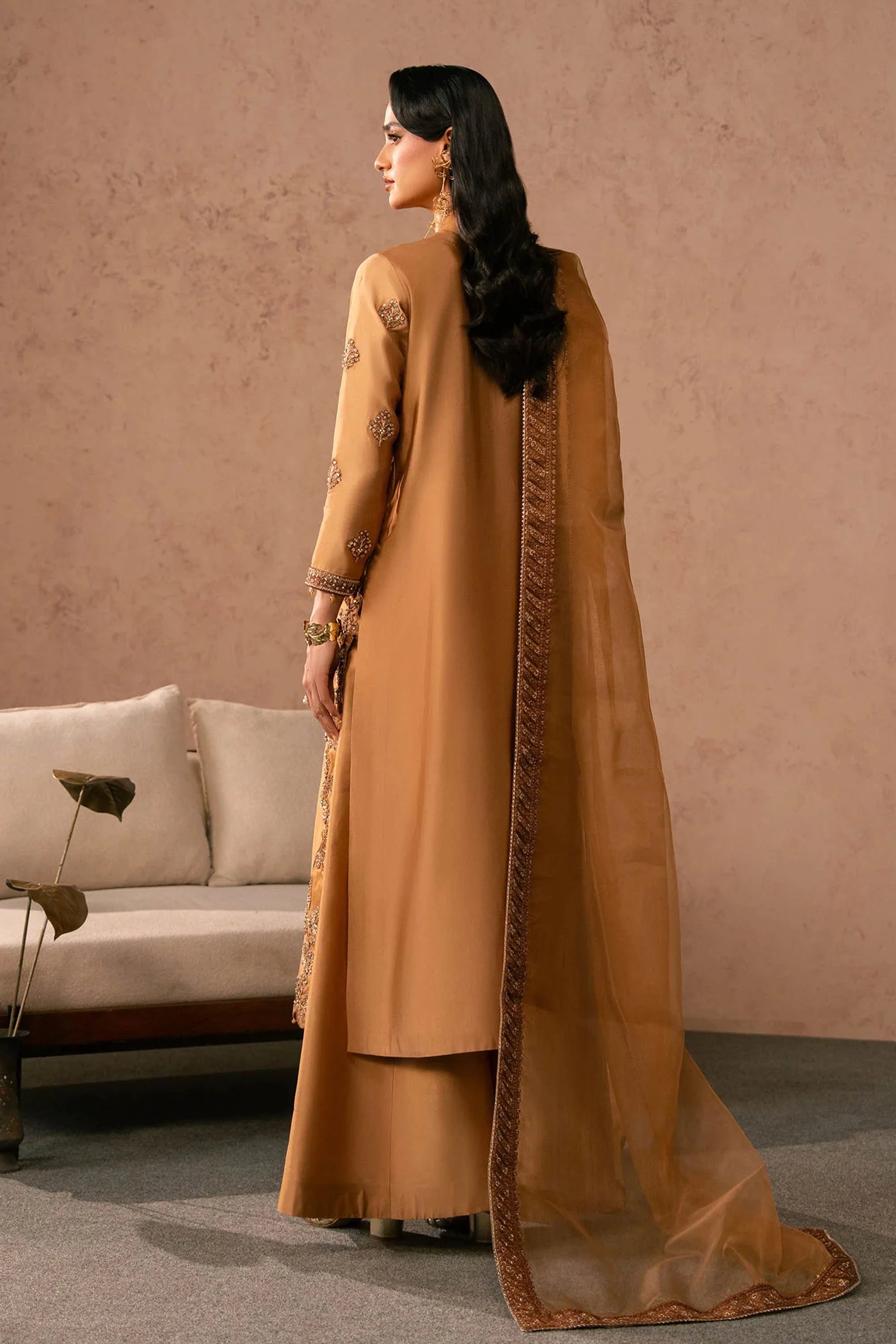 Girl wearing tissue silk dress by Buraqstore styled for luxury events