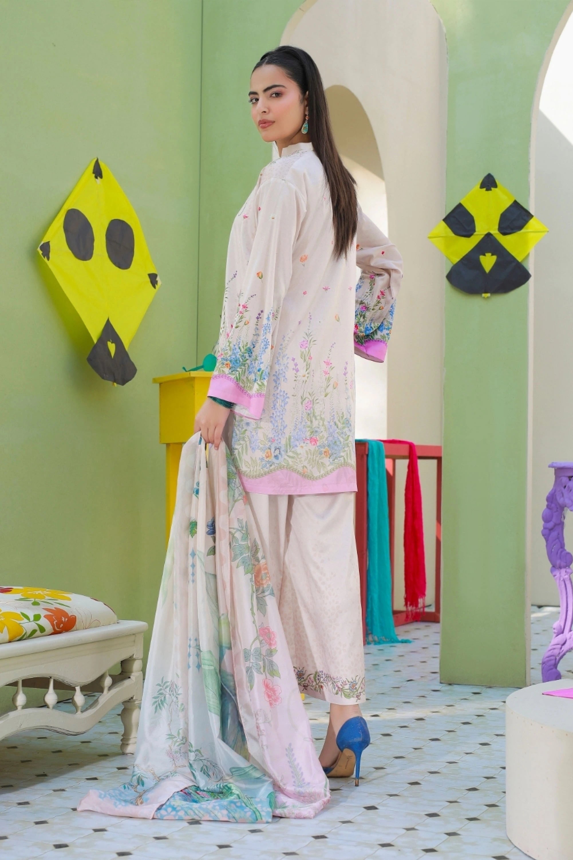 woman posing in white dress pakistani casual outfit buraqstore