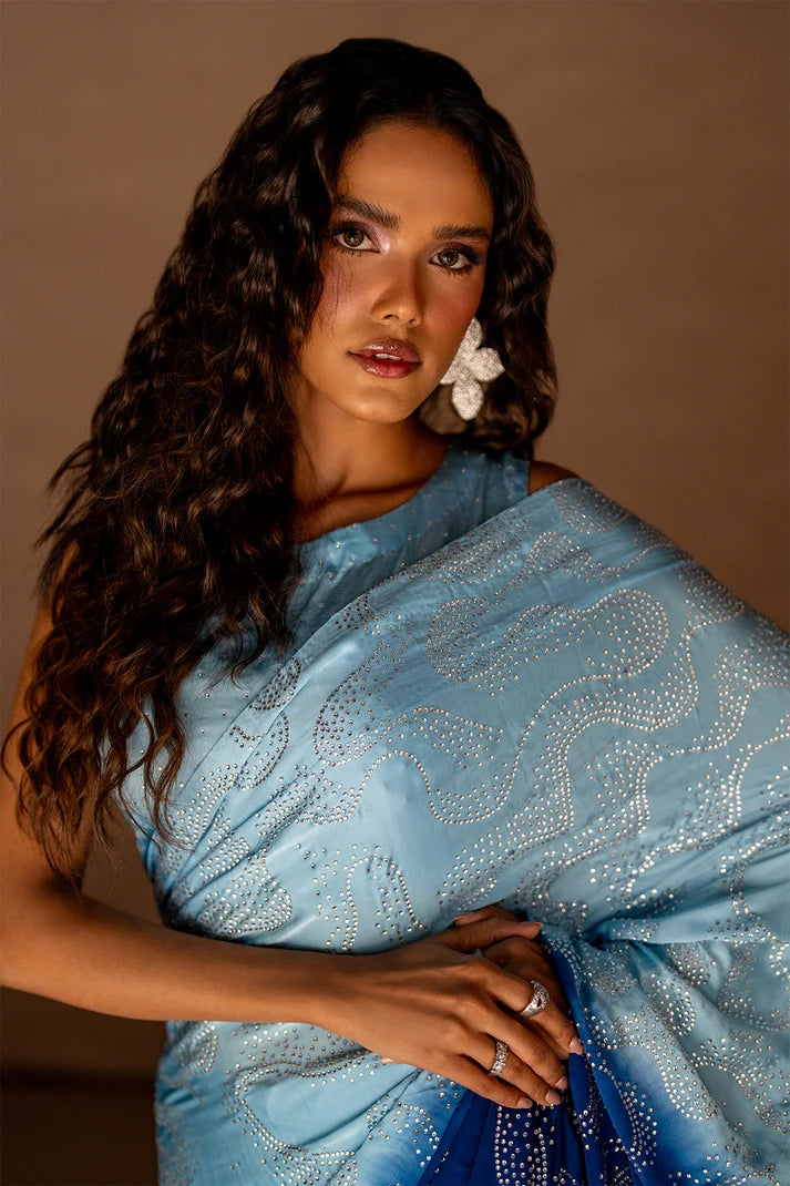 Women wearing blue silk saree price in pakistan set as a party look, shop pure shamoz silk saree online at Buraqstore