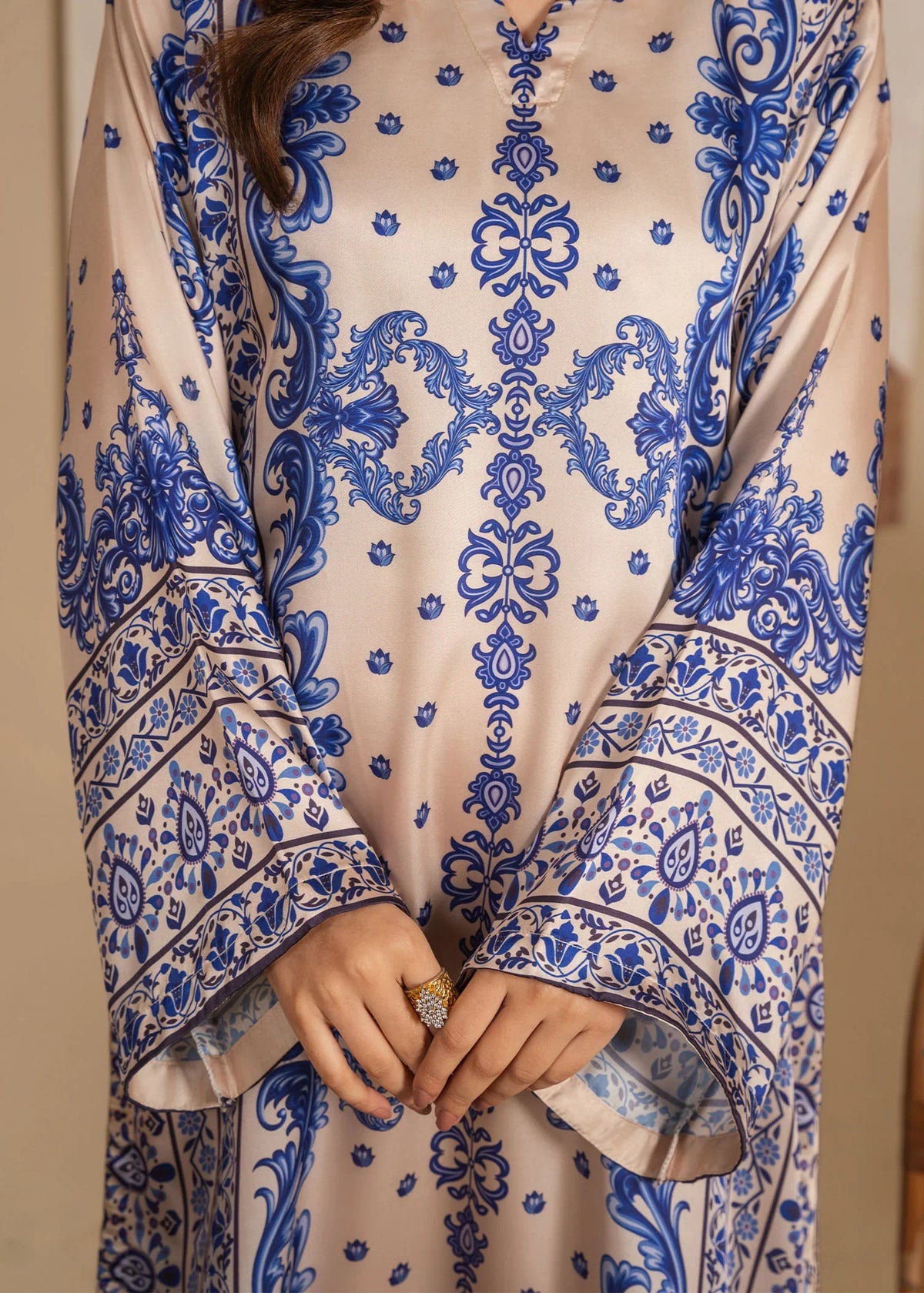 Model wearing beige color dress pakistani, side view showing the fit of the printed shamooz 1PC, Buraqstore