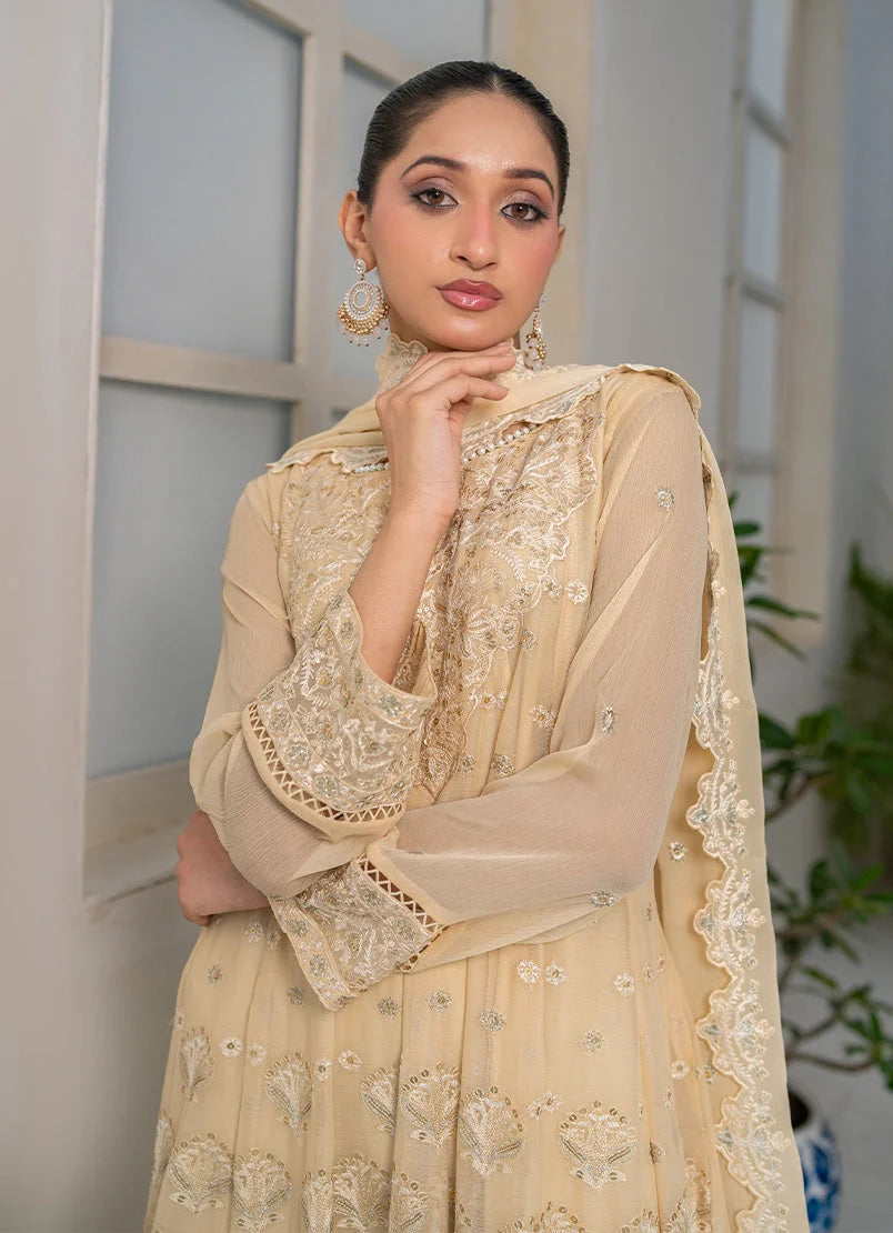 Model wearing beige color dress pakistani as a festive outfit, shop the embroidered chiffon 3-piece set at Buraqstore
