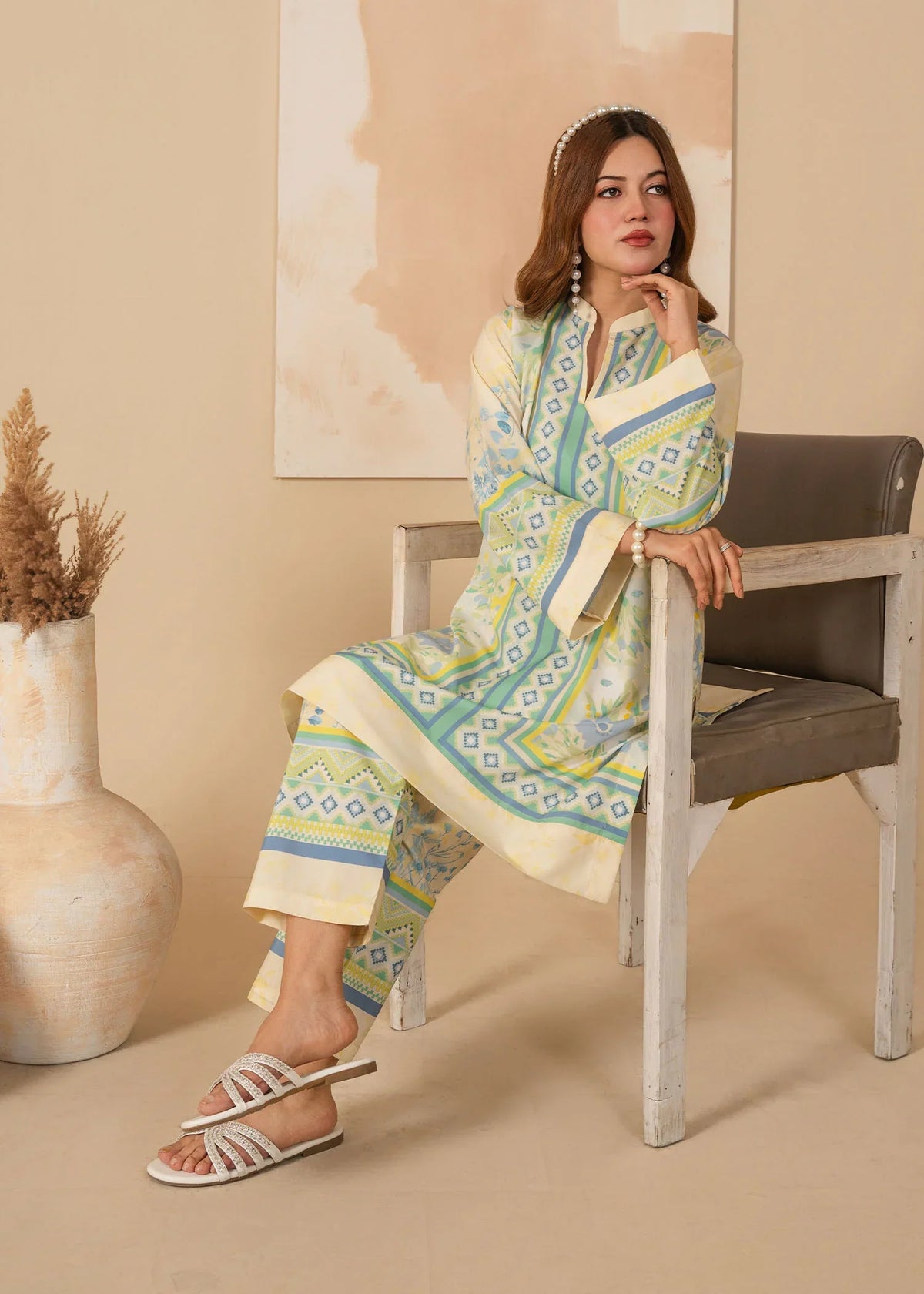 Model wearing beige summer lawn dress design for warm days, shop printed poly lawn 2PC at Buraqstore