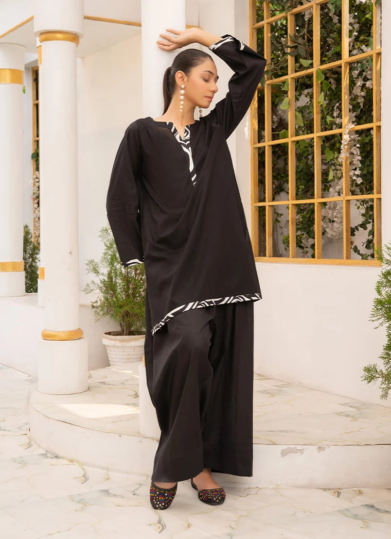 Model wearing black co ord set, side view showing the fit of the cotton 2-piece set, Buraqstore