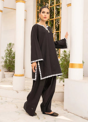 Women wearing solid co ord set, close-up of the dori and lace detail on the cotton top, Buraqstore