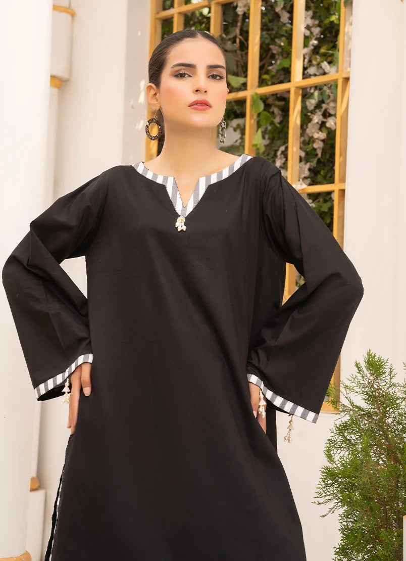 Women wearing solid co ord set, back view of the cotton top with dori and lace trim, Buraqstore