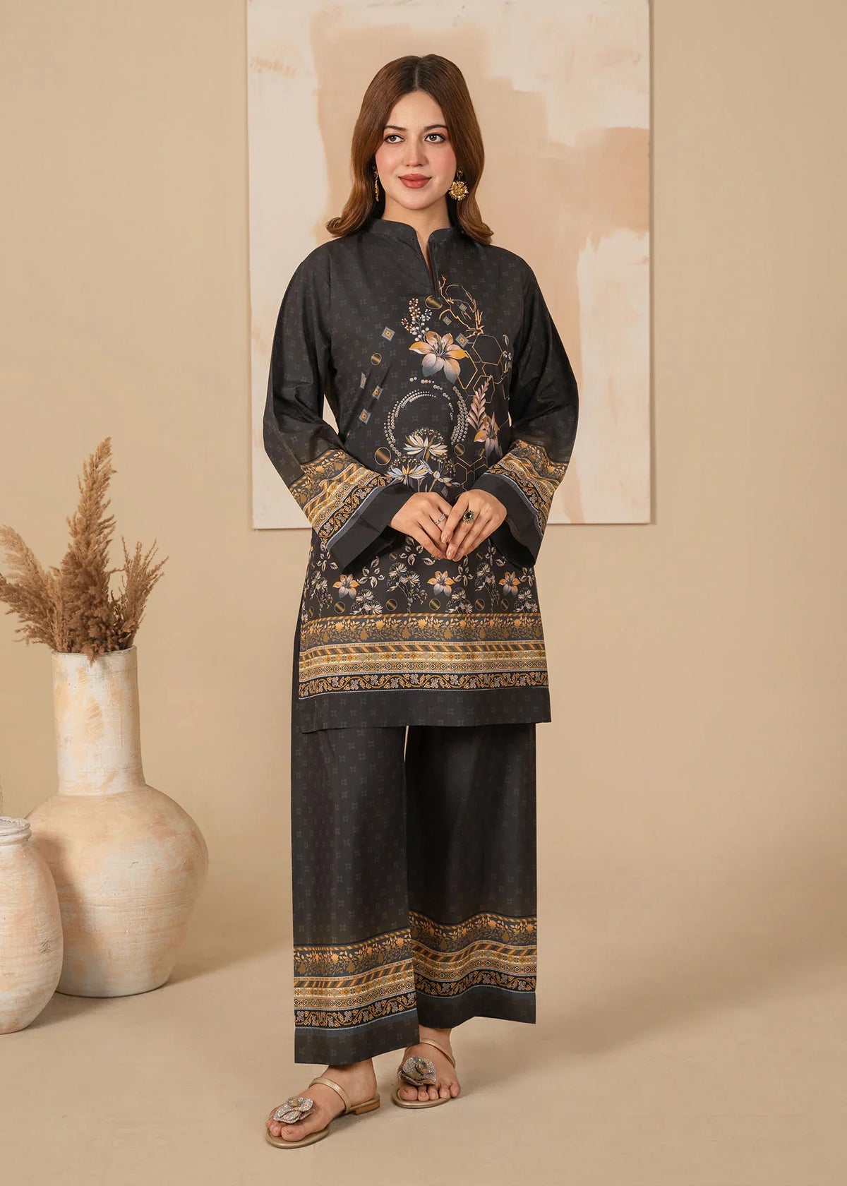 Model wearing black dress design, printed grip 2PC set, front view from Buraqstore