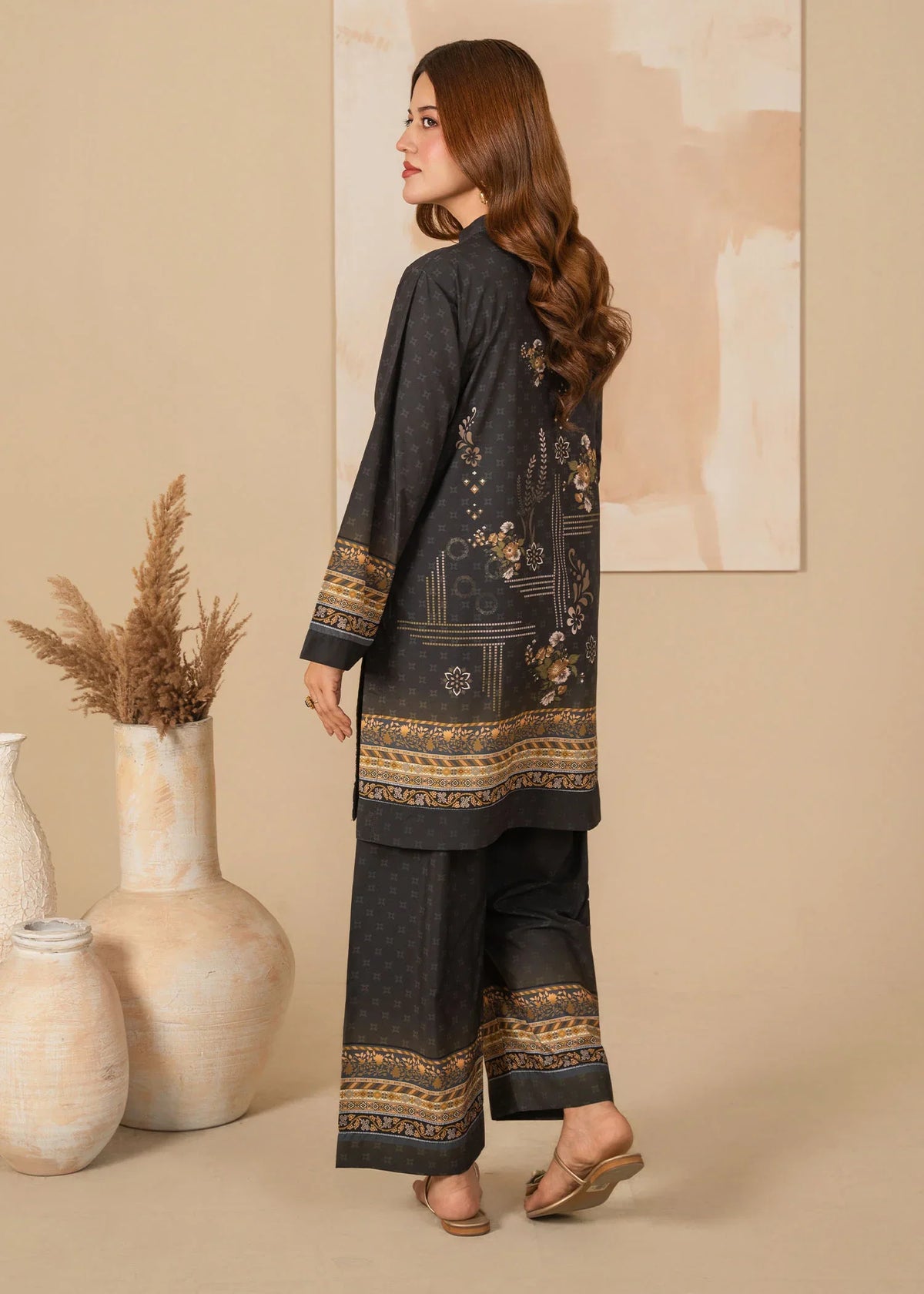 Women wearing black dress design, close-up of the print on the grip fabric, Buraqstore