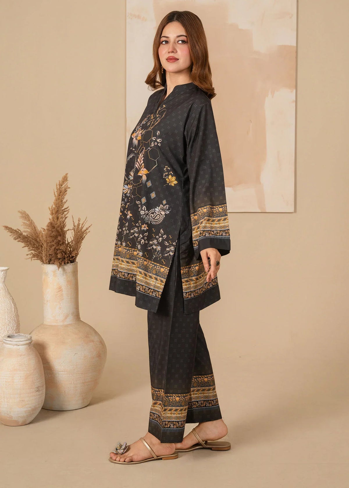 Model wearing black dress design as a daily outfit, shop printed grip 2PC at Buraqstore