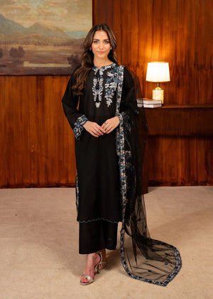 Model wearing black dress design, an embroidered lawn shirt and trouser 3PC set with a net dupatta, front view from Buraqstore