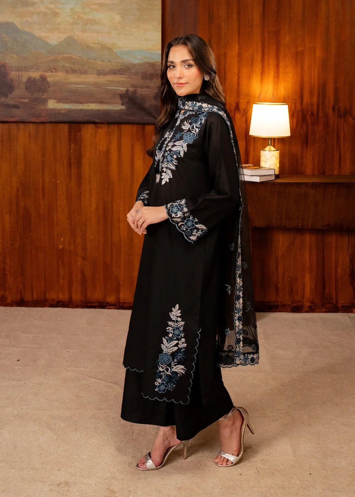 Women wearing black dress design, close-up of the embroidery on the lawn shirt, Buraqstore