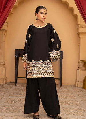 Model wearing black dress for women, embroidered bana dora fabric shirt and bottom, front view from Buraqstore