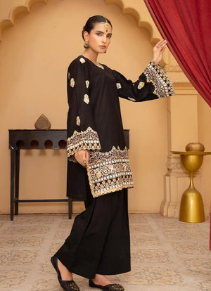 Model wearing black dress for women, side view showing the fit of the bana dora 2-piece set, Buraqstore
