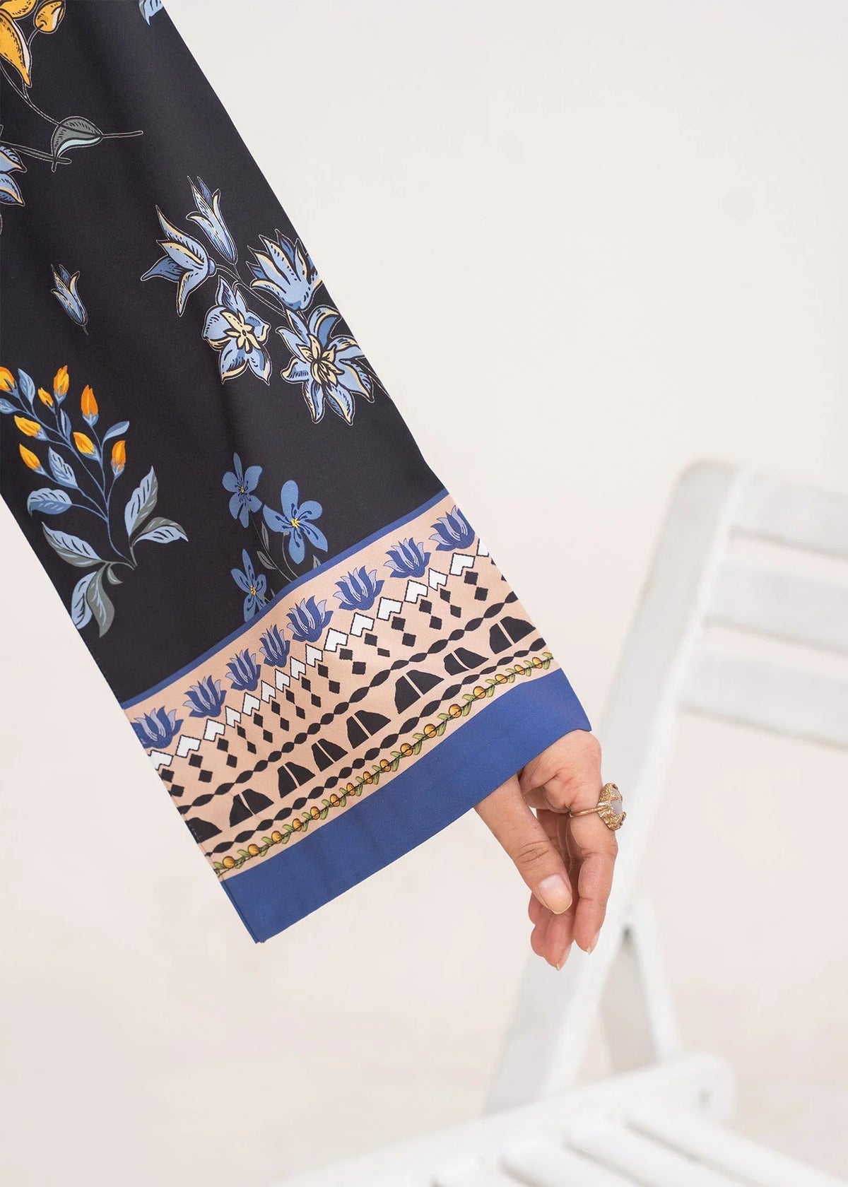 Women wearing black co ord set, side view showing the fit of the printed grip set, Buraqstore