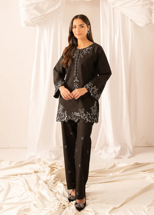 Model wearing black lawn dress, embroidered 2PC set, front view from Buraqstore