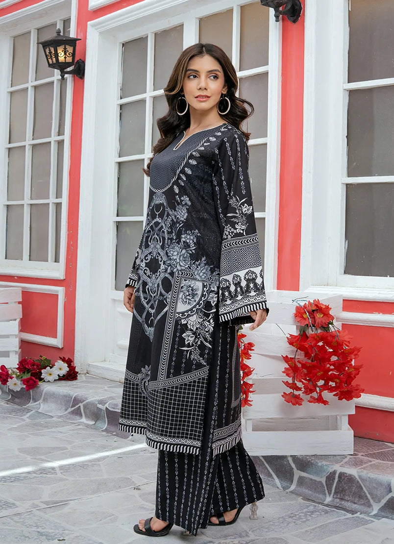 Model wearing black dress online, side view showing the fit of the printed lawn 2PC, Buraqstore