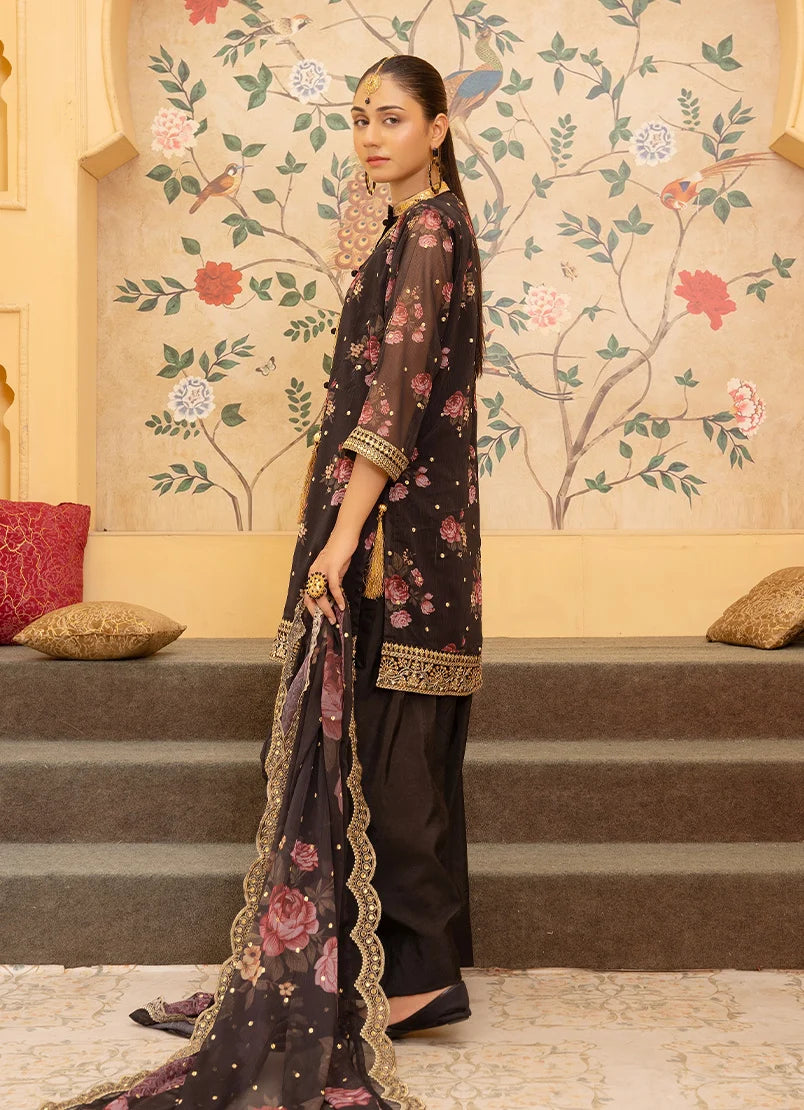 Women wearing black dress design, close-up of the gotta patti and tassel detailing on the silk shirt, Buraqstore