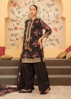 Model wearing black dress design, side view showing the fall of the silk 3-piece set, Buraqstore
