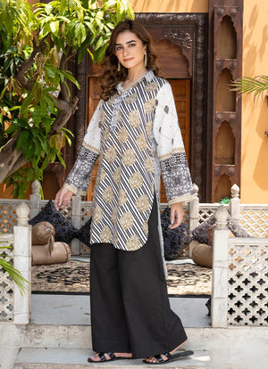 Model wearing black and white dress, side view showing the fit of the printed lawn 2PC, Buraqstore