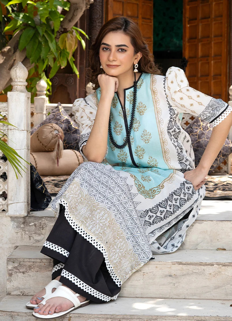 Women wearing black and white dress design, back view of the printed lawn shirt and trouser, Buraqstore