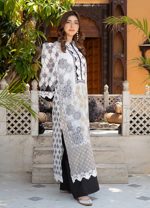 Women wearing black and white dress pakistani, close-up of the print on the lawn shirt, Buraqstore