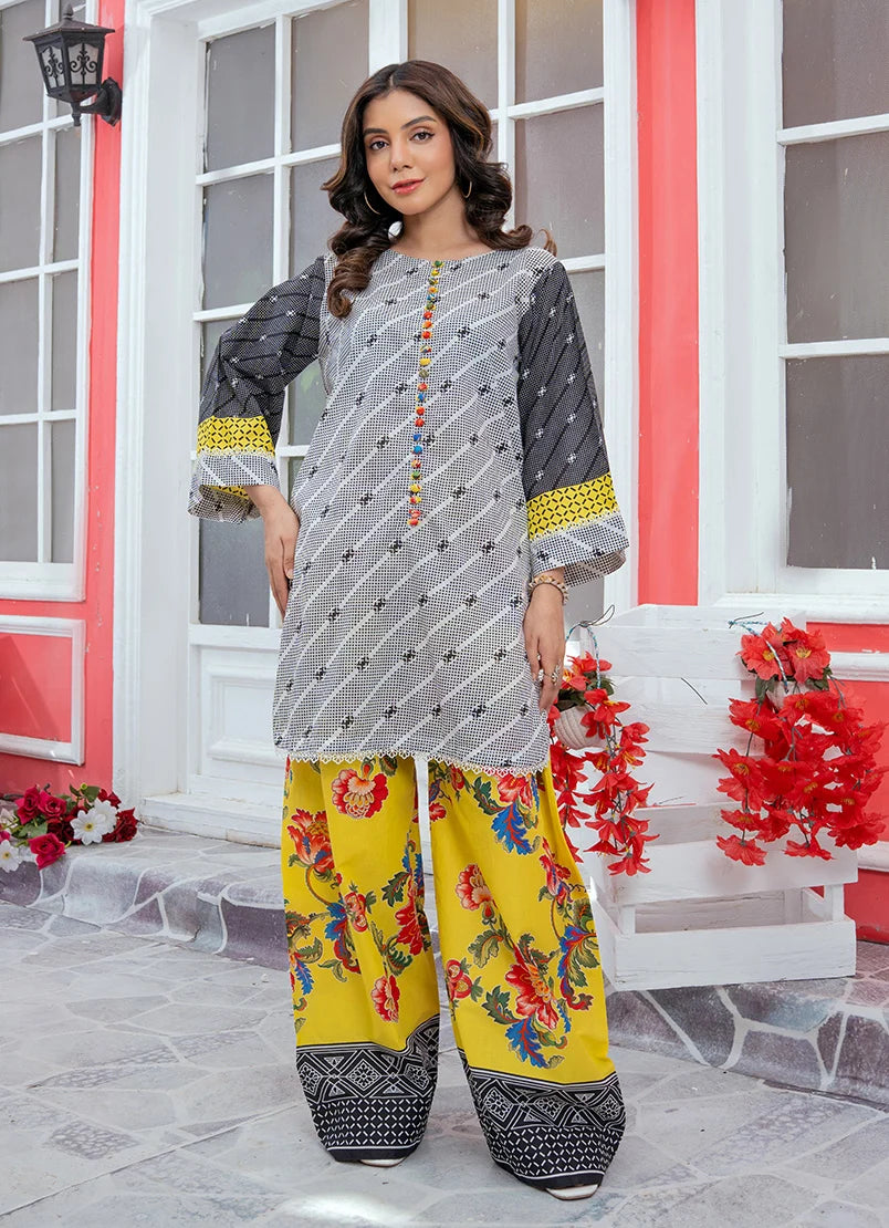 Model wearing black colour dress with yellow accents, a printed lawn shirt and trouser, front view from Buraqstore