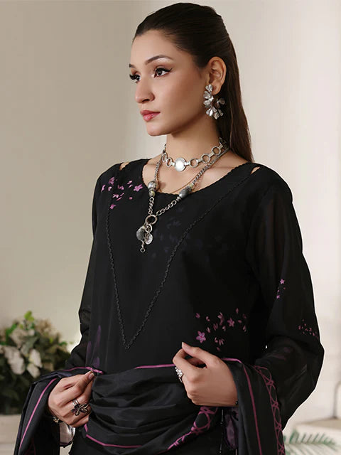 girl posing in Buraqstore chiffon outfit with black fancy dress pakistani appeal for formal occasions