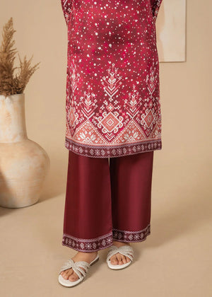Model wearing blood red dress design, side view showing the fit of the printed shamooz 2PC, Buraqstore