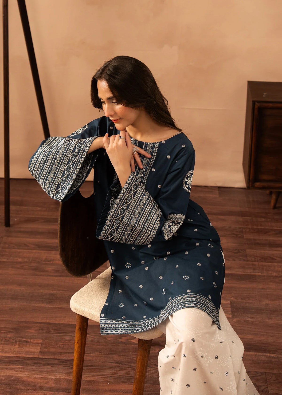 Women wearing blue dress design, back view of the embroidered shirt and trouser, Buraqstore