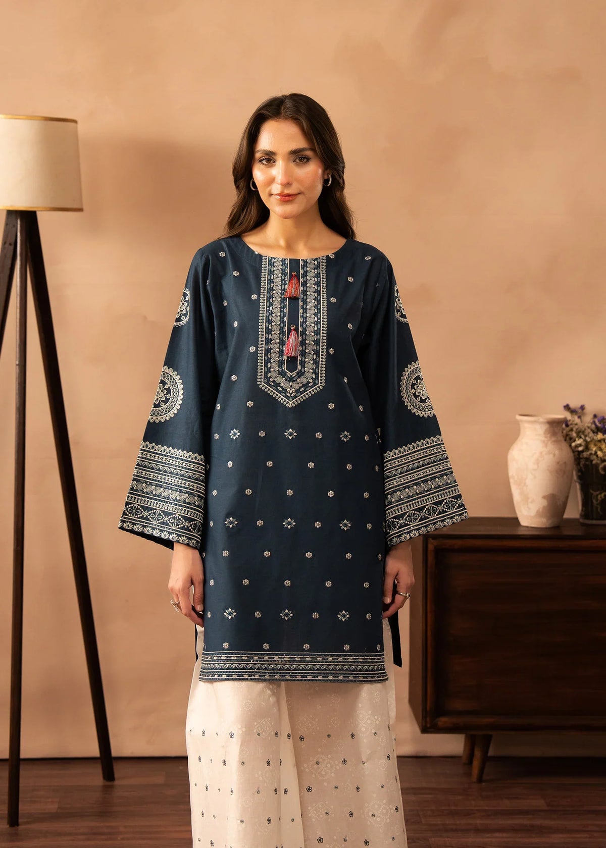 Model wearing blue dress design as a daily outfit, shop embroidered lawn 2PC at Buraqstore