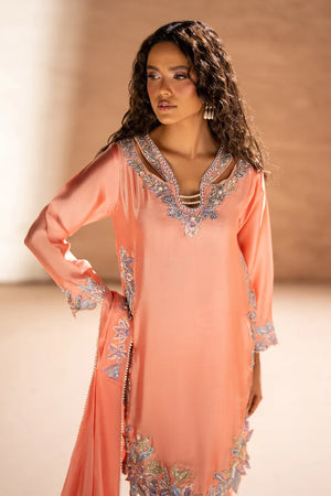Model wearing blush peach sheesha silk dress design with matching sheesha silk trouser, side view of the 3PC at Buraqstore