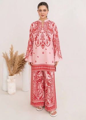 Women wearing blush pink lawn co ord sets, printed 2-piece poly lawn set, front view from Buraqstore