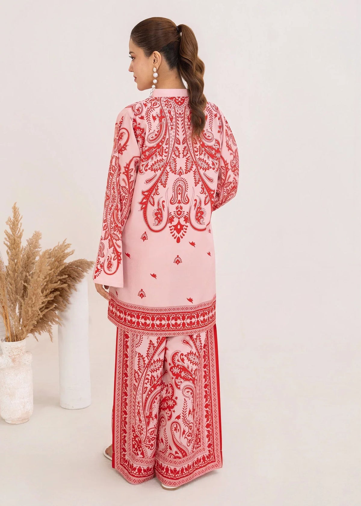 Model wearing blush pink lawn co ord sets in a relaxed standing pose, printed poly lawn 2-piece at Buraqstore