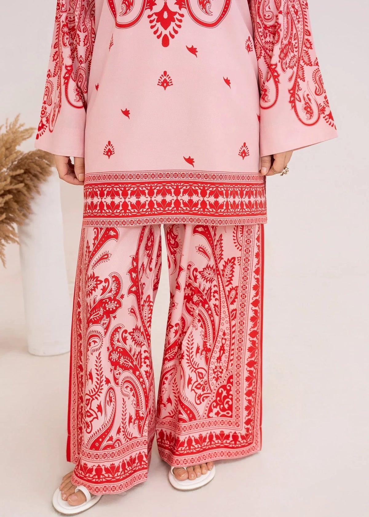 Women wearing blush pink lawn co ord sets, side view showing the fit of the printed poly lawn set, Buraqstore