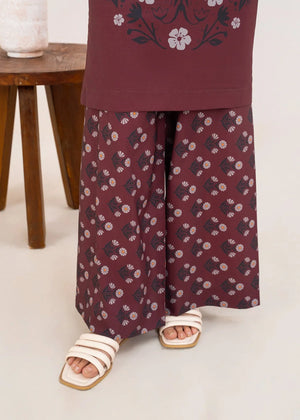 Women wearing brown printed co ord set, close-up of the print on the grip top and bottom, Buraqstore