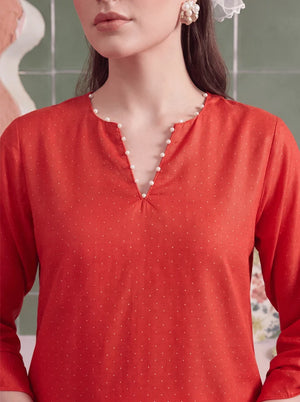 Model wearing coral color dress, side view showing the fit of the shirt and trouser 2PC, Buraqstore