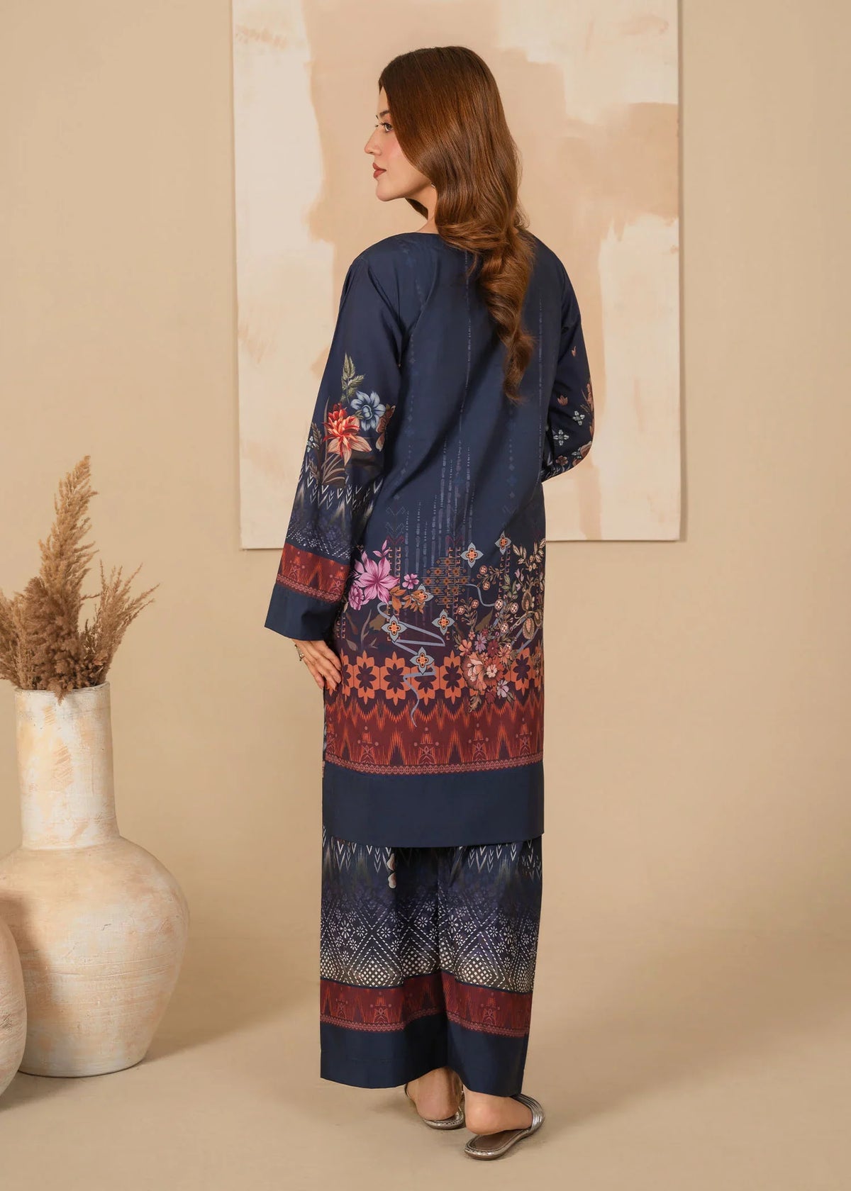 Women wearing dark blue color dress, close-up of the print on the poly lawn shirt, Buraqstore