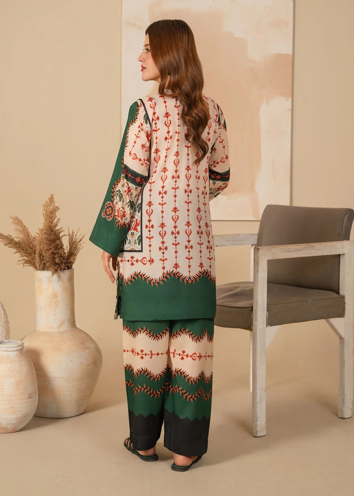 Women wearing dark green dress pakistani, close-up of the print on the poly lawn shirt, Buraqstore