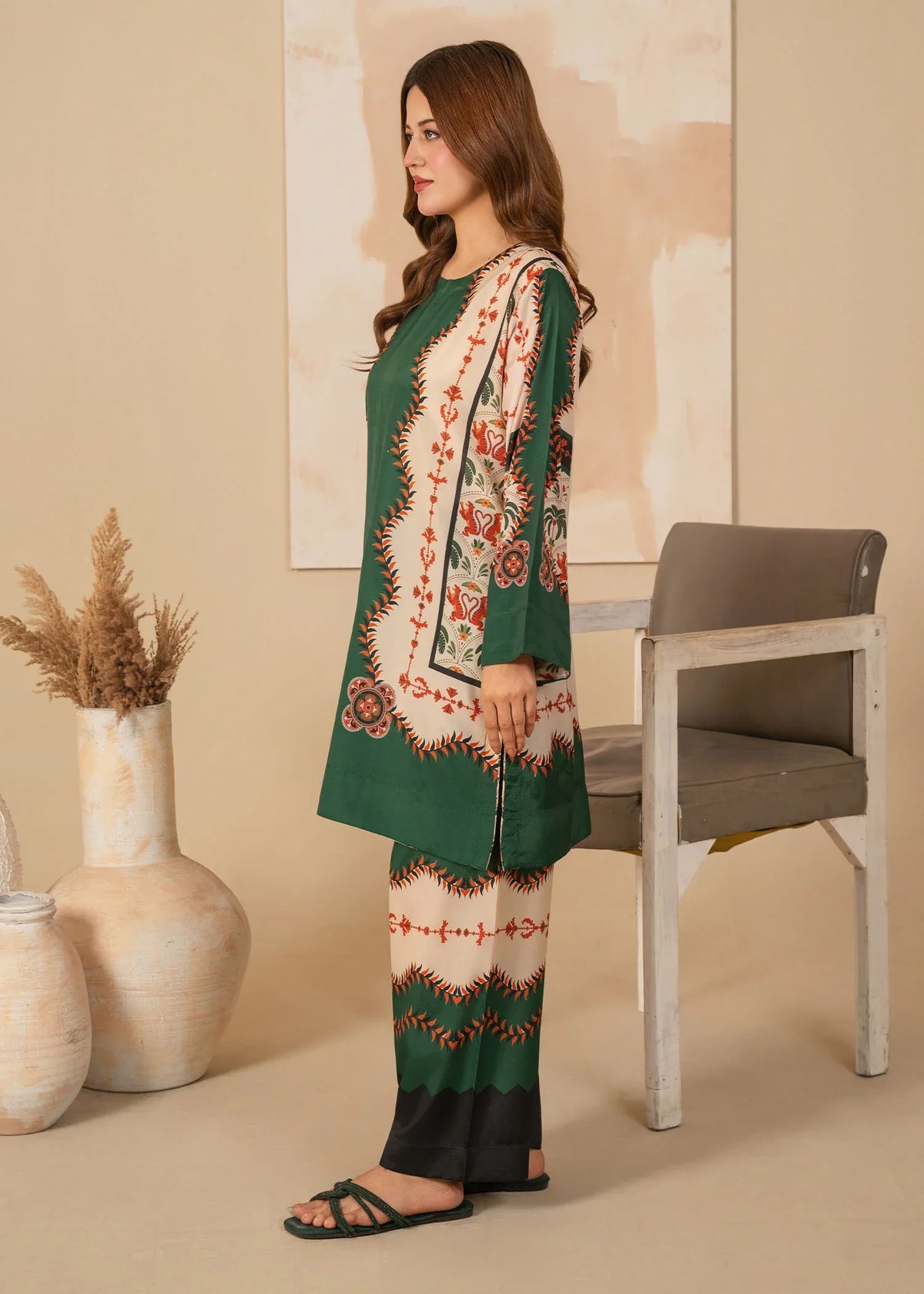 Model wearing dark green dress pakistani as a casual outfit, shop printed poly lawn 2PC at Buraqstore